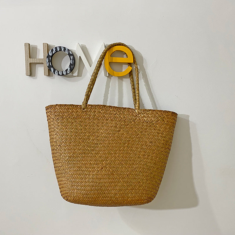 Handmade crochet straw knit woven summer bag for women from the summer collection